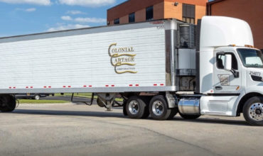 LTL Solutions: Colonial Cartage tractor trailer pulling into the corporate office parking lot